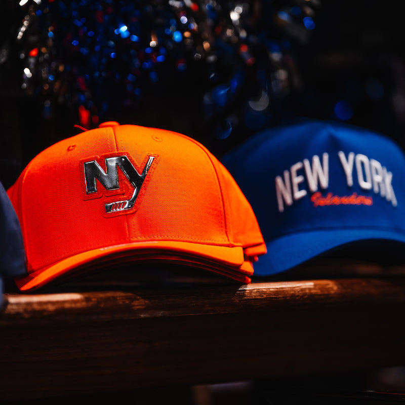 Islanders Platinum Ice Orange Baseball Hat