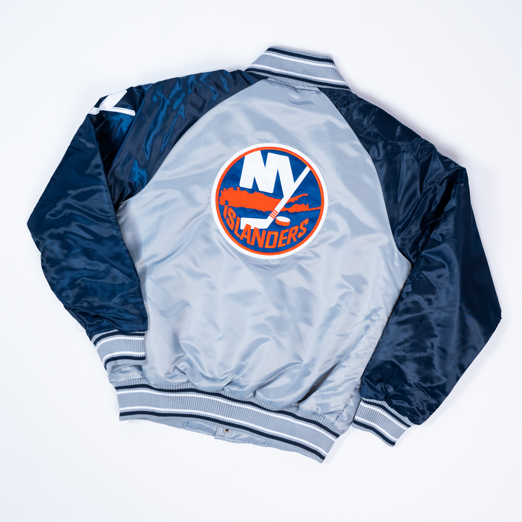 New York Islanders Youth grey and navy satin varsity jacket made by Starter.