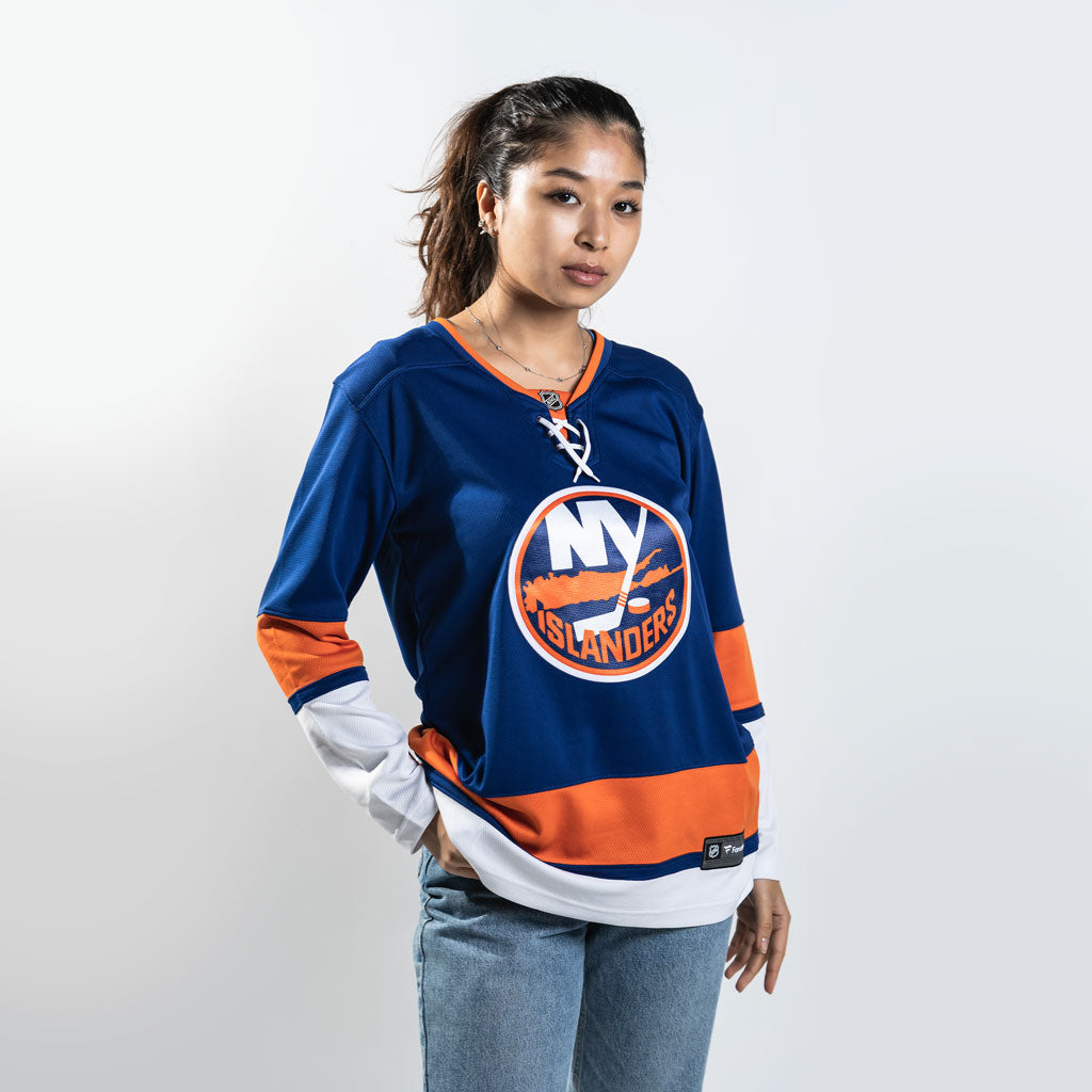 On Model New York Islanders Womens blue home primary jersey with orange and white stripe made by Fanatics