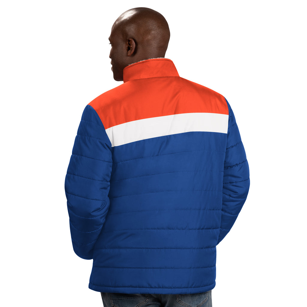 New York Islanders royal blue sherpa lined puffer jacket with orange and white stripe and primary logo made by GIII on model