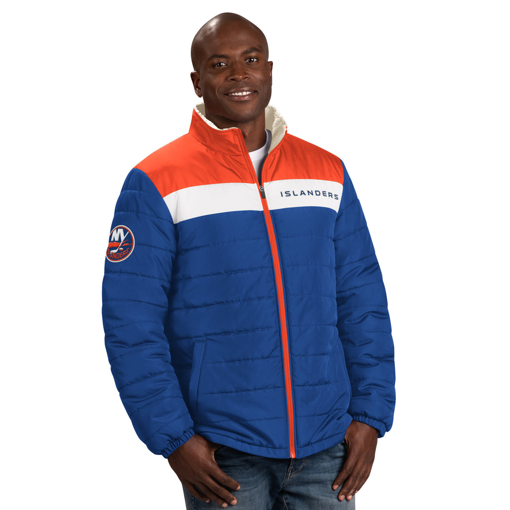 New York Islanders royal blue sherpa lined puffer jacket with orange and white stripe and primary logo made by GIII on model
